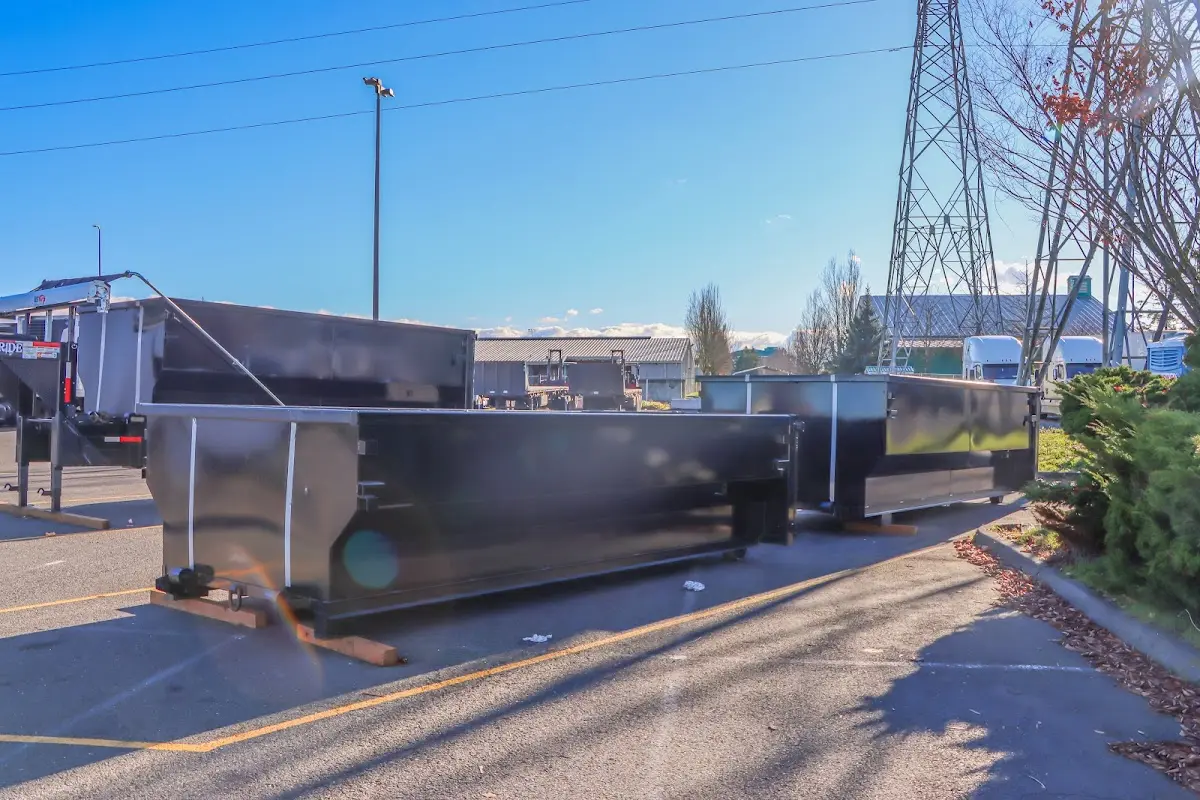 Roll-off dumpster ready for waste disposal at job site for Concrete Dumpster Rental in Euclid